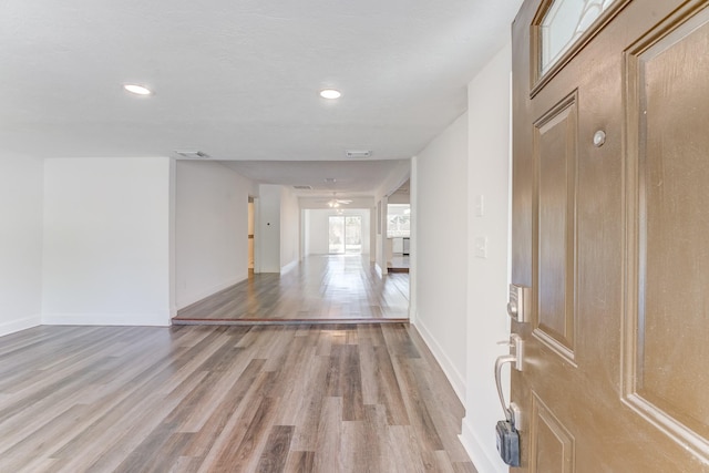 interior space featuring ceiling fan and light hardwood / wood-style flooring