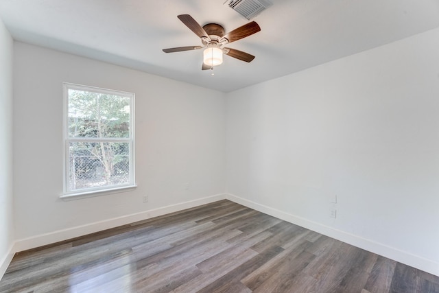 unfurnished room featuring hardwood / wood-style flooring and ceiling fan