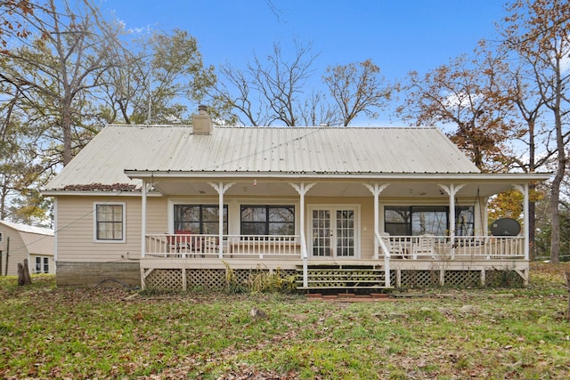 back of house with a porch