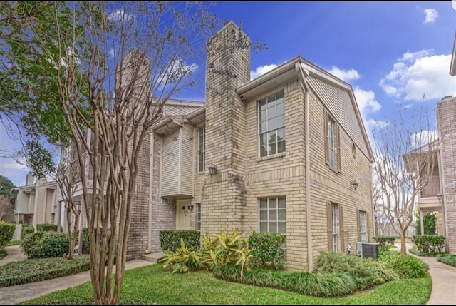 view of front of house with central AC unit