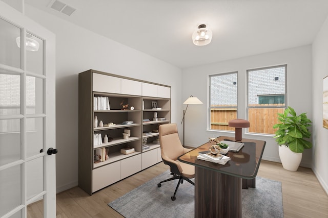 office space featuring light hardwood / wood-style floors