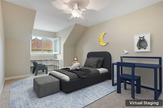 carpeted bedroom featuring ceiling fan, a textured ceiling, and vaulted ceiling