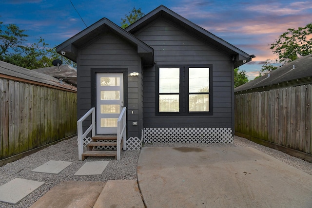 view of front of property featuring a patio area