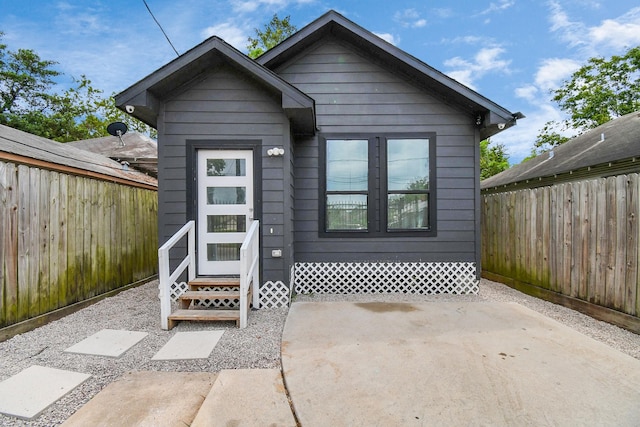 view of front of property with a patio