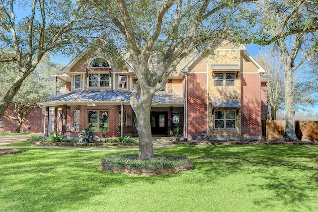 view of front of home with a front lawn and covered porch