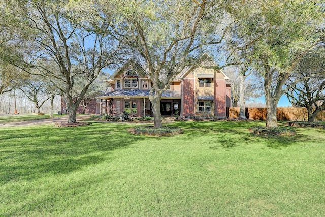 view of front of property with a front lawn