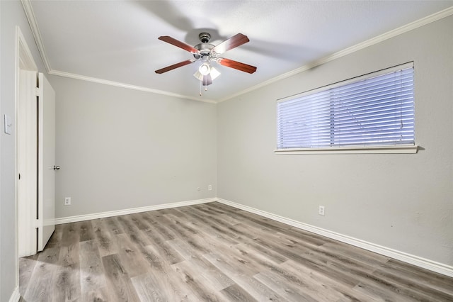 unfurnished room with ceiling fan, crown molding, and light hardwood / wood-style flooring