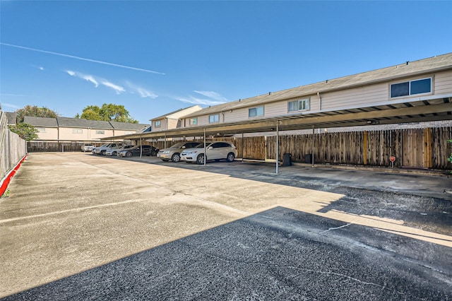 6111 Beverly Hill St Unit 33, Houston, TX 77057 - view of parking / parking lot with a carport