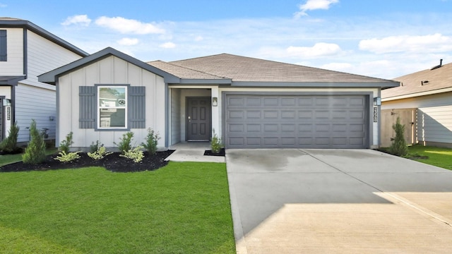 ranch-style home with a garage and a front lawn