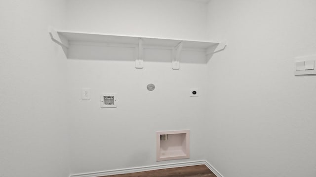 laundry room featuring hookup for an electric dryer, washer hookup, hardwood / wood-style flooring, and hookup for a gas dryer