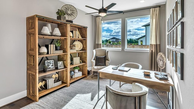 office area featuring ceiling fan, hardwood / wood-style floors, and vaulted ceiling