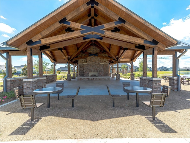 view of property's community with a gazebo and a patio area