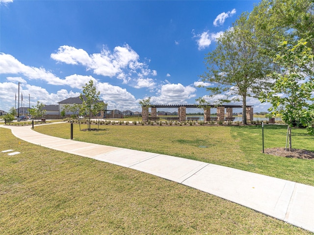 view of home's community featuring a lawn