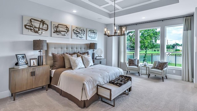 bedroom with light colored carpet, multiple windows, and a notable chandelier