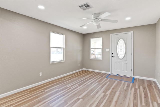 entryway featuring light hardwood / wood-style flooring and ceiling fan