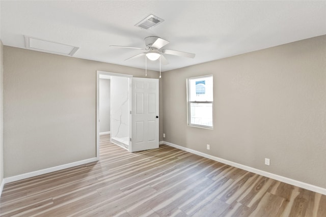 unfurnished bedroom featuring ceiling fan and light wood-type flooring