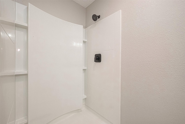 bathroom with walk in shower