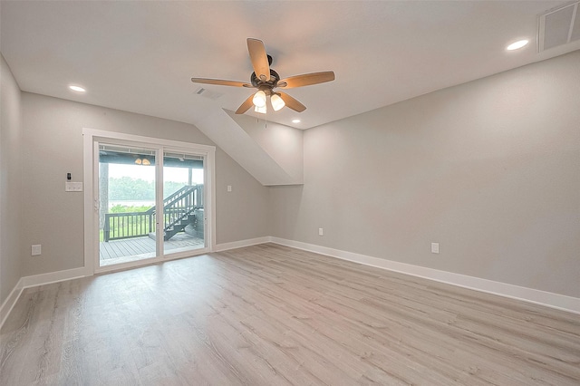 additional living space featuring light hardwood / wood-style floors and ceiling fan