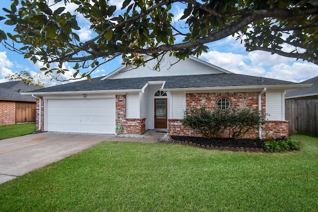 ranch-style house featuring a garage and a front lawn