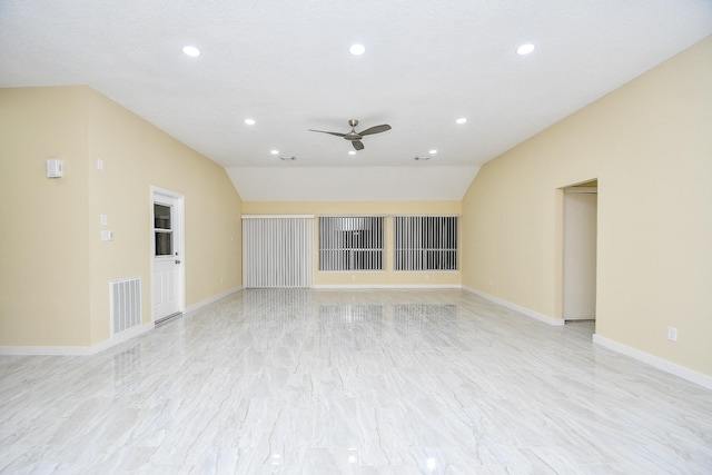 empty room with vaulted ceiling and ceiling fan