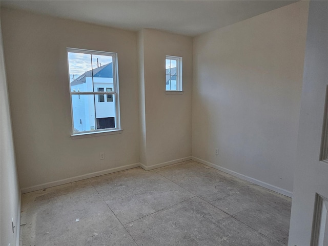 empty room featuring a wealth of natural light