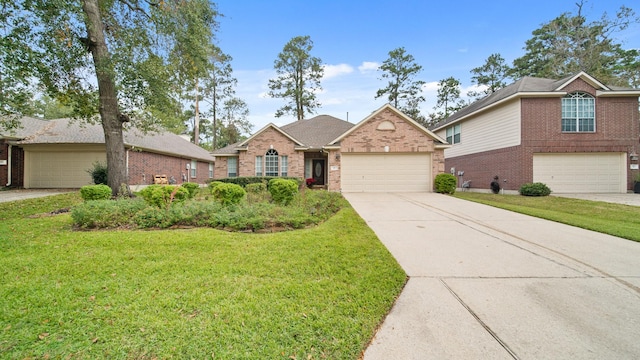 view of front of home featuring a garage and a front lawn