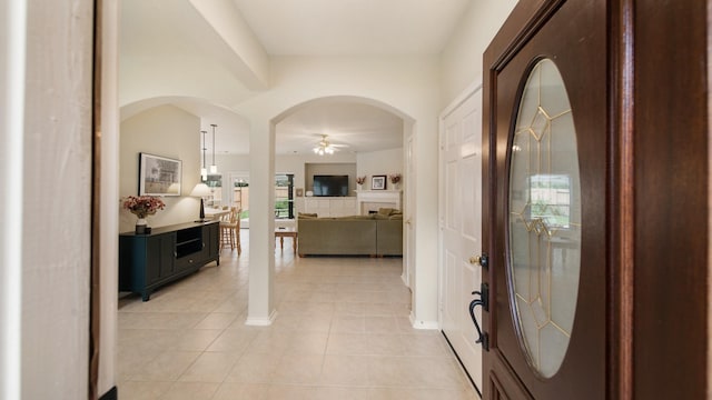 hallway featuring light tile patterned flooring