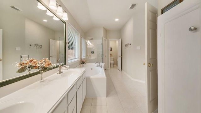 full bathroom featuring tile patterned floors, vanity, separate shower and tub, and toilet