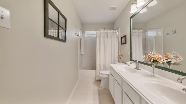 full bathroom with tile patterned floors, vanity, shower / bathtub combination with curtain, and toilet