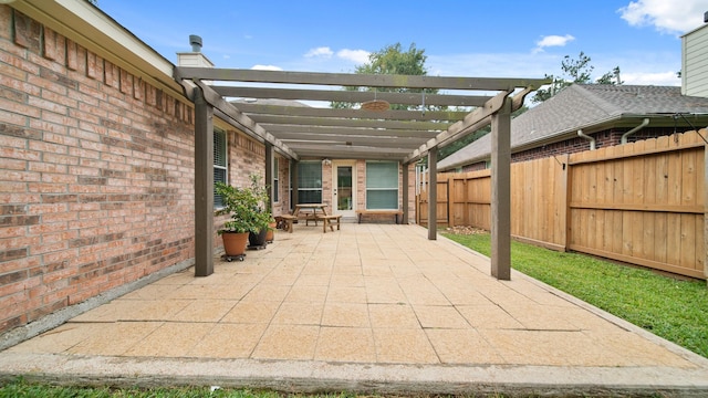 view of patio featuring a pergola