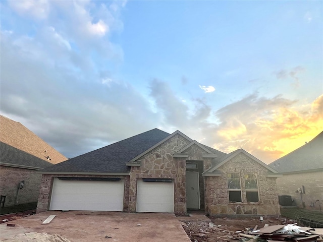 view of front of property featuring a garage