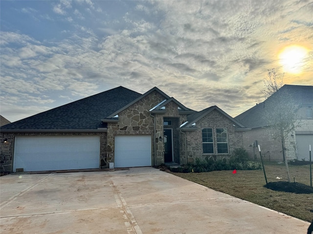 view of front of home featuring a garage