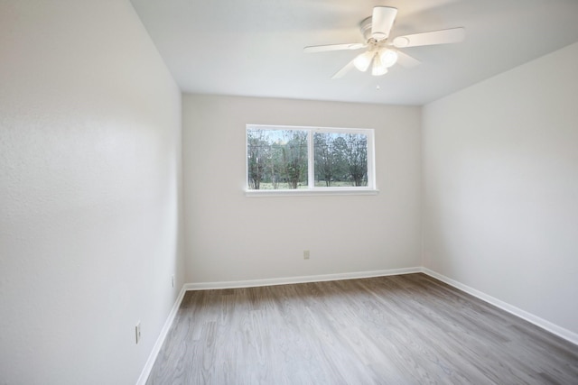 unfurnished room featuring ceiling fan and light wood-type flooring