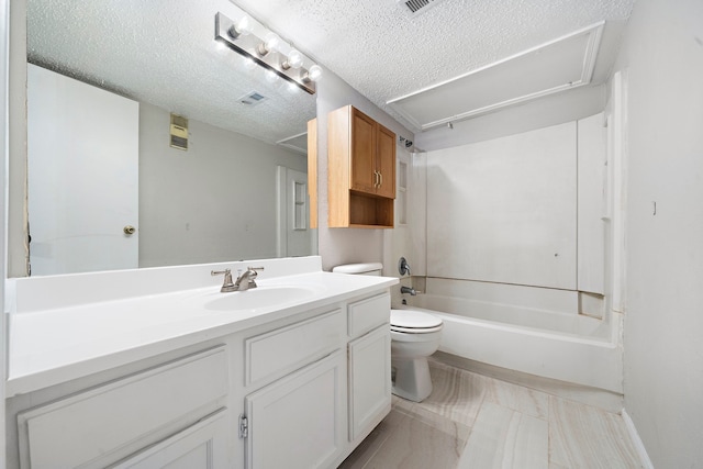 full bathroom featuring vanity, shower / bathing tub combination, a textured ceiling, and toilet