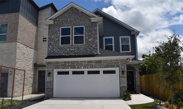 view of front of home with a garage