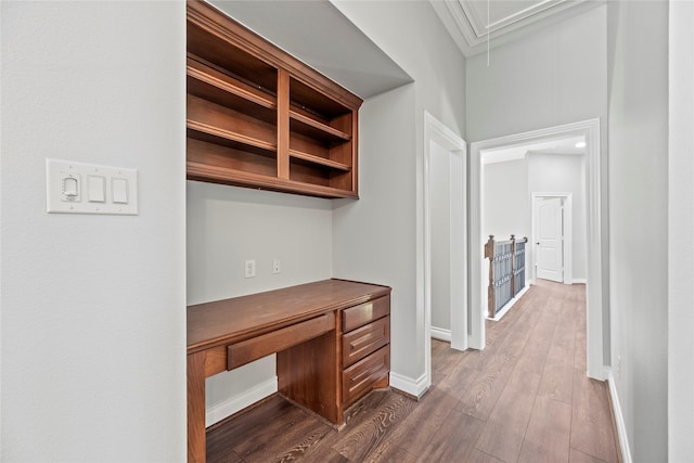 unfurnished office with dark wood-type flooring