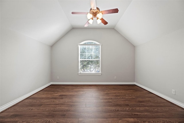 additional living space with dark hardwood / wood-style floors, ceiling fan, and lofted ceiling