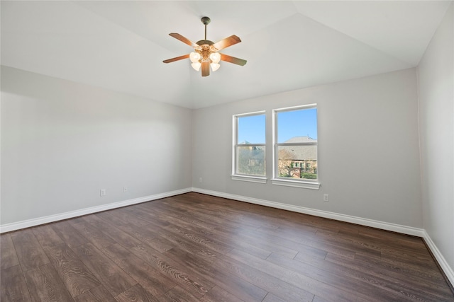 spare room featuring lofted ceiling, ceiling fan, and dark hardwood / wood-style floors