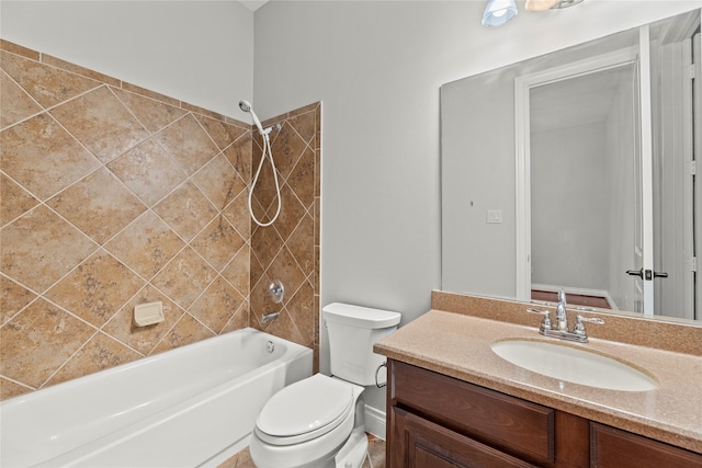 full bathroom featuring vanity, toilet, and tiled shower / bath