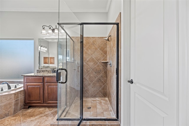 bathroom featuring tile patterned floors, a wealth of natural light, vanity, crown molding, and plus walk in shower