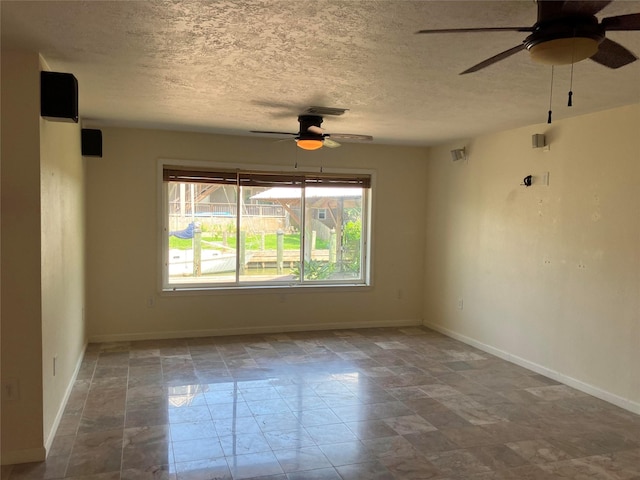 spare room featuring ceiling fan