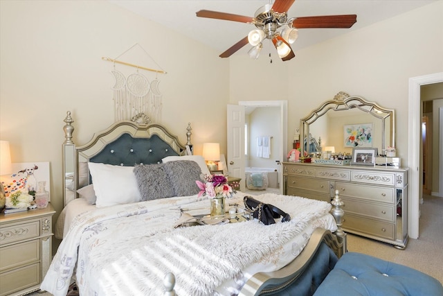 bedroom featuring ceiling fan and light colored carpet