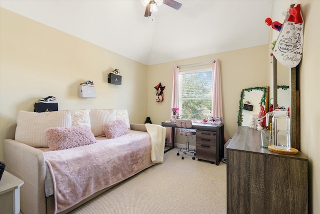 carpeted bedroom featuring ceiling fan and lofted ceiling