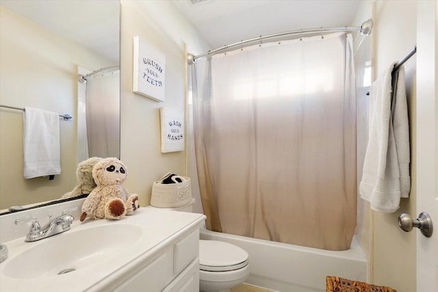 full bathroom with vanity, toilet, and shower / bath combo with shower curtain