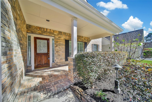 entrance to property with covered porch