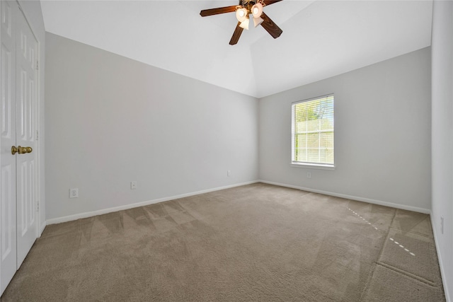 unfurnished room with carpet, ceiling fan, and lofted ceiling