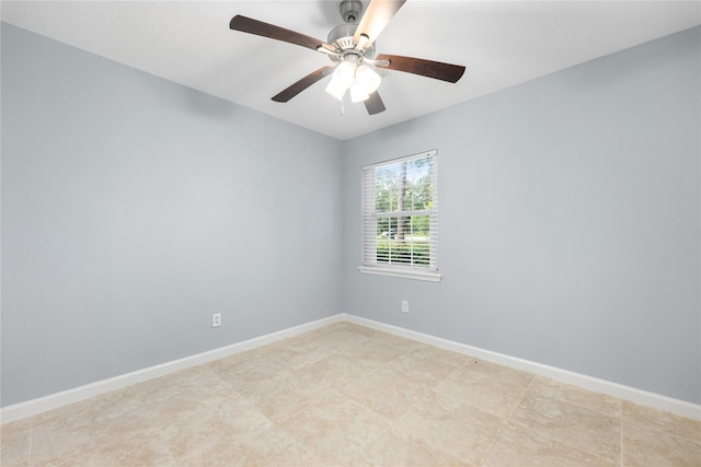 empty room featuring ceiling fan