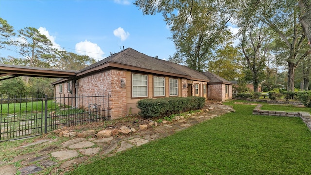 view of property exterior with a lawn