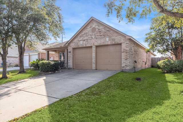 view of front facade featuring a front yard and a garage