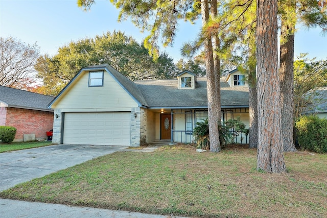 view of front of home featuring a front lawn, roof with shingles, concrete driveway, an attached garage, and brick siding